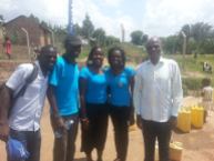 Rotaract Jagwe, Andrew, Stella, Beatrice and Rotarian Peter Mugagga during the commisioning of the water well in Masooli